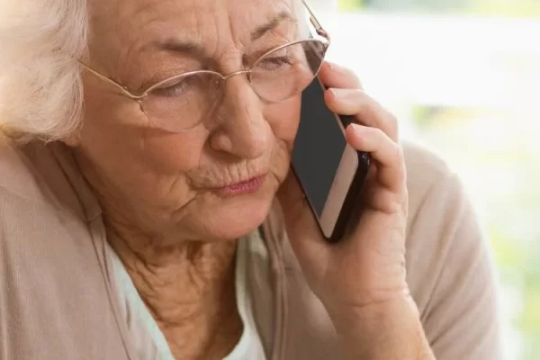 image of elderly woman on the telephone